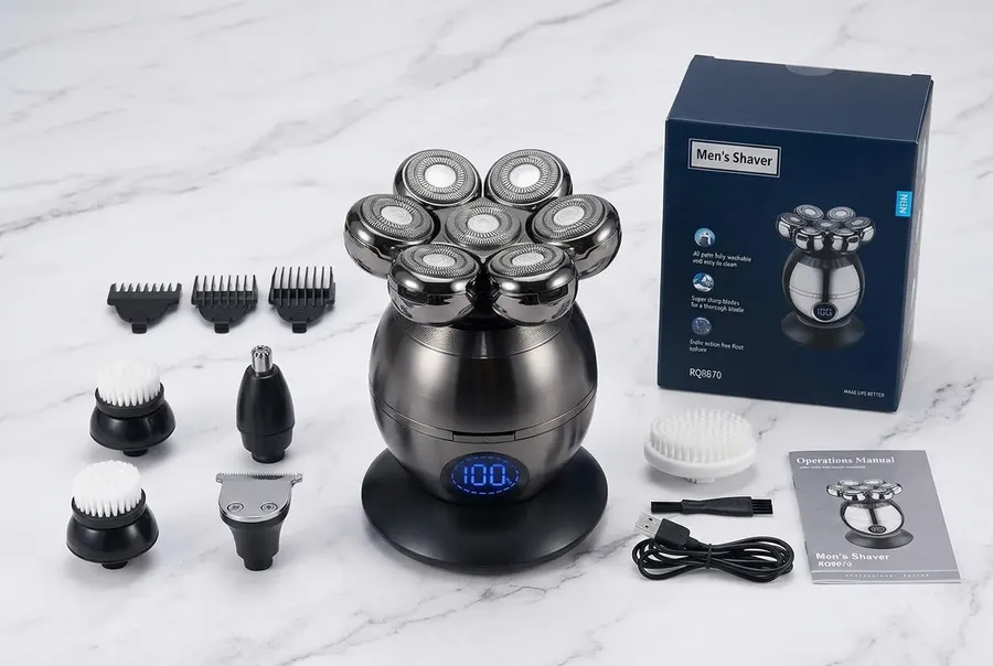 A sleek rotary electric head shaver resting upright on a clean white bathroom counter beside a neatly folded towel and a s...