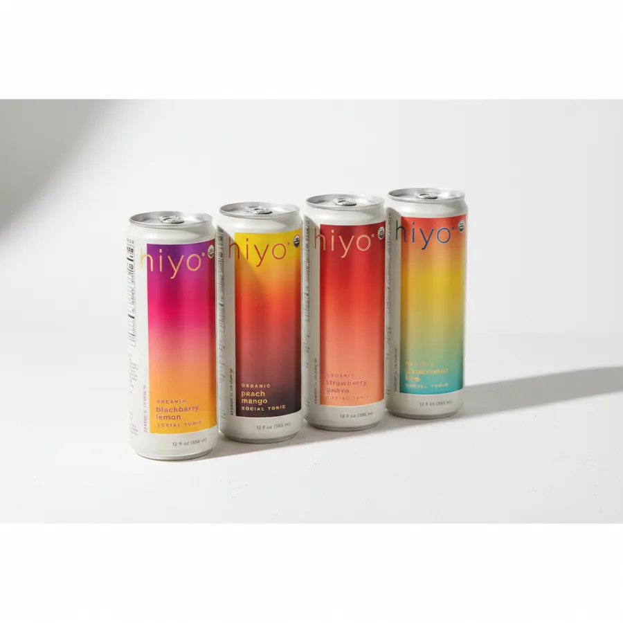 An organic seltzer can displayed on a natural wooden surface with fresh botanicals and citrus nearby, bright clean natural...