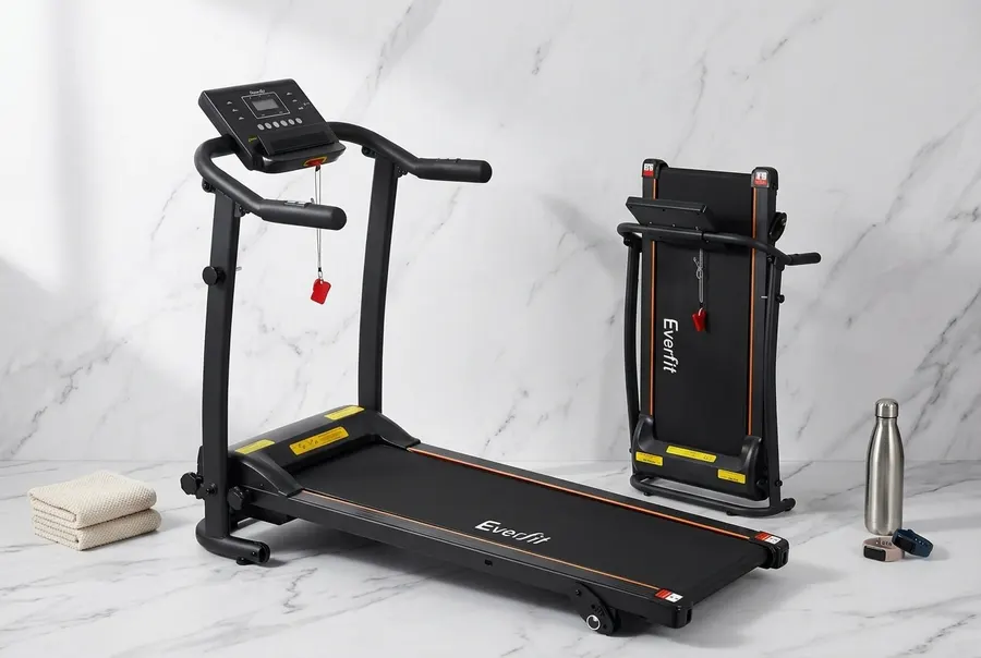 A sleek modern home treadmill centered in frame, upright, occupying 60% of frame height against a clean warm-lit backdrop....