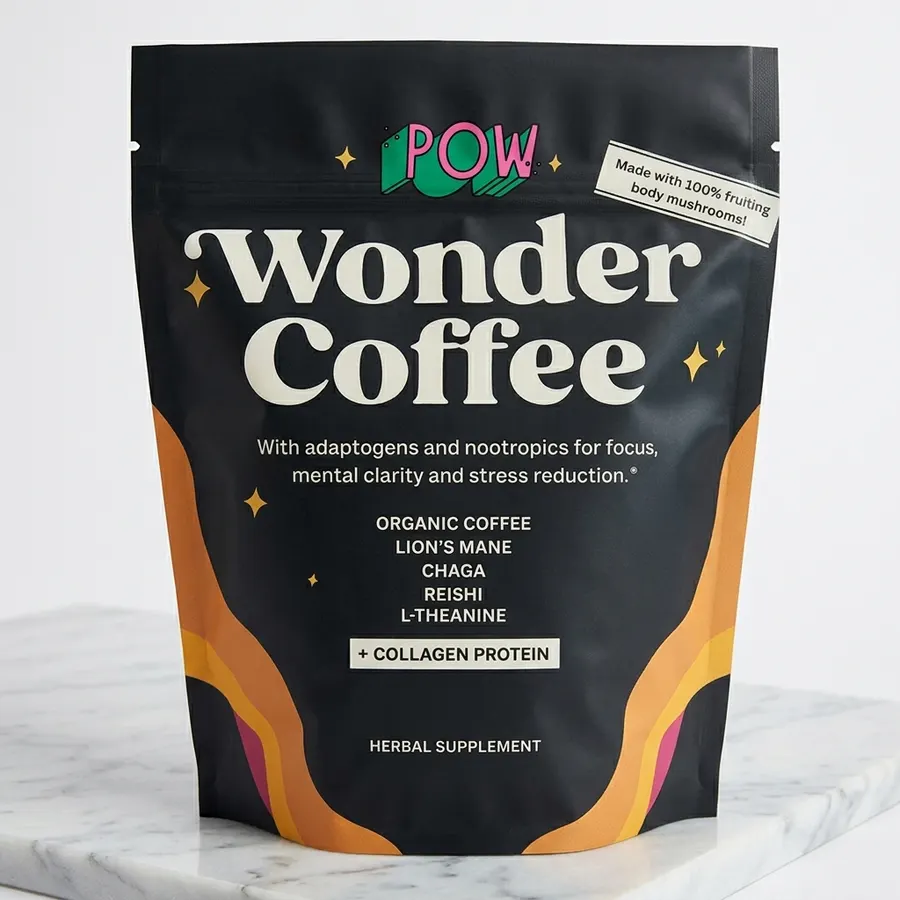 A frosted glass pour-over vessel or clean ceramic mug filled with rich, amber-brown brewed coffee on a light wooden surfac...